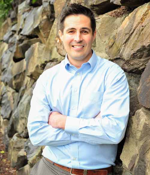 dental-implant-dentist-travis-howey-photo